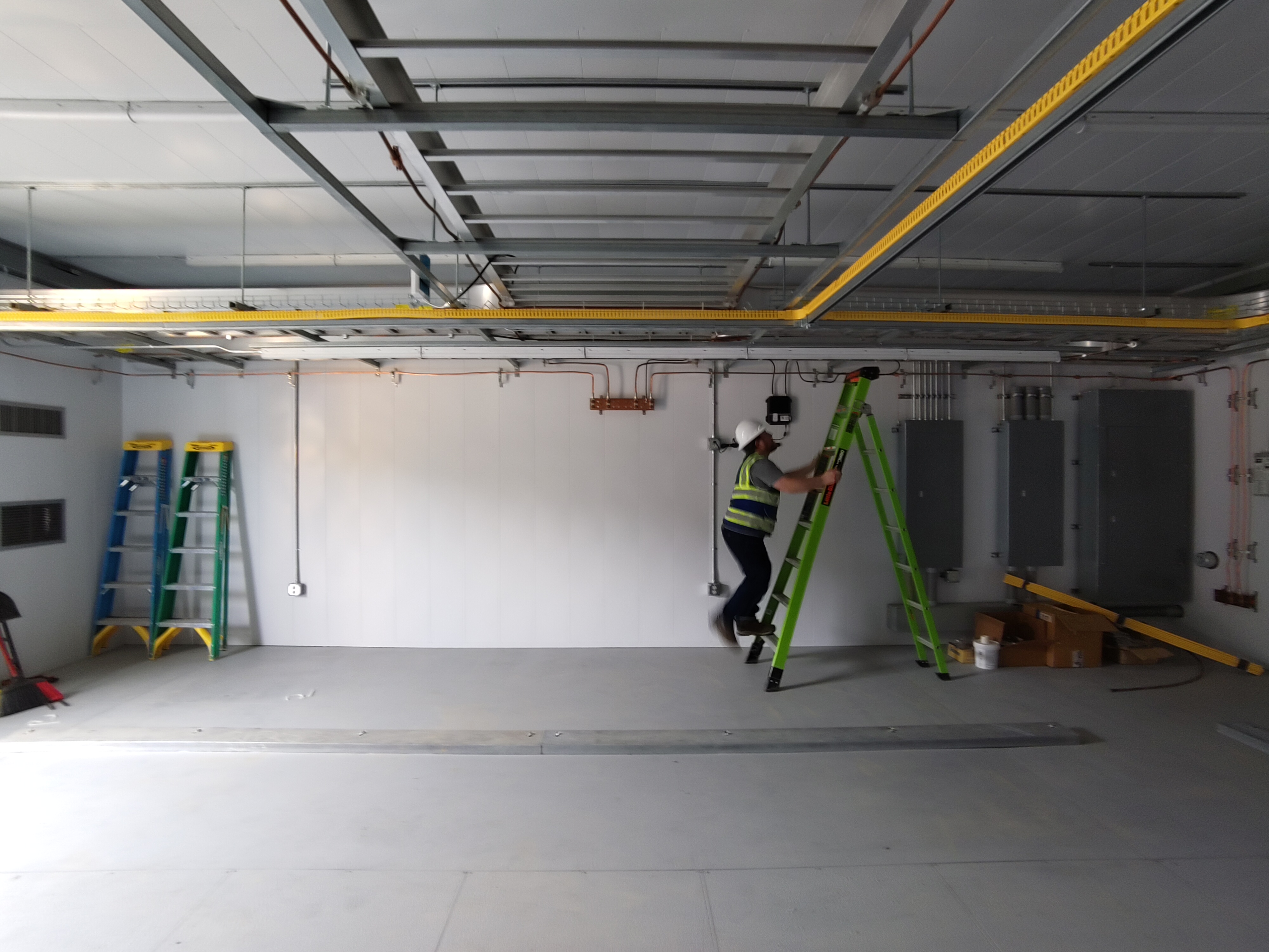 Precision Grid Services crew on a substation control building installation